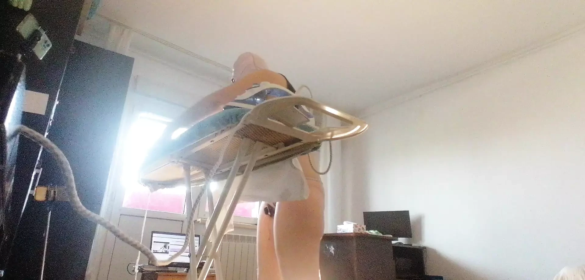Sexy woman doing naked housework. Brunette, hairy pussy, big ass, big tits. Sexy mom massages herself with a vibrator.