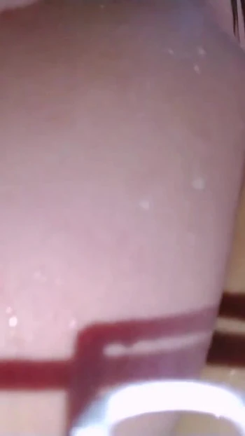 Thrilling moment from "SEXY college girl in the shower SPANKING her ASS really HARD"