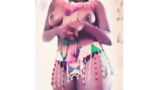 Thicc topless African girl uses phone as a mirror