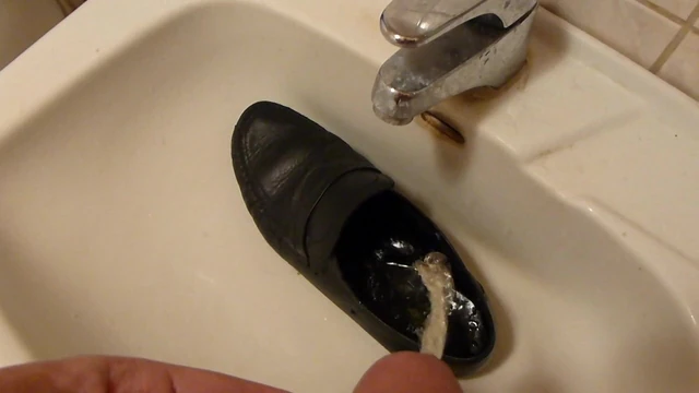 Piss in men's dress shoe