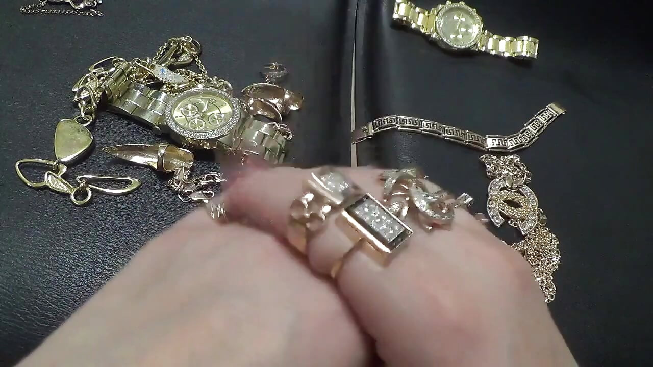 Golden jewelry and hand fetish