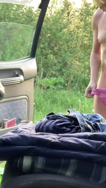 Stunning moment from "Transgirl Alexa Cosmic soaking and swimming in denim shorts and top and nude in the lake"