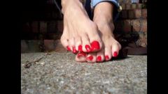 Long red toenails