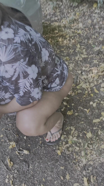 Pissing next to the car