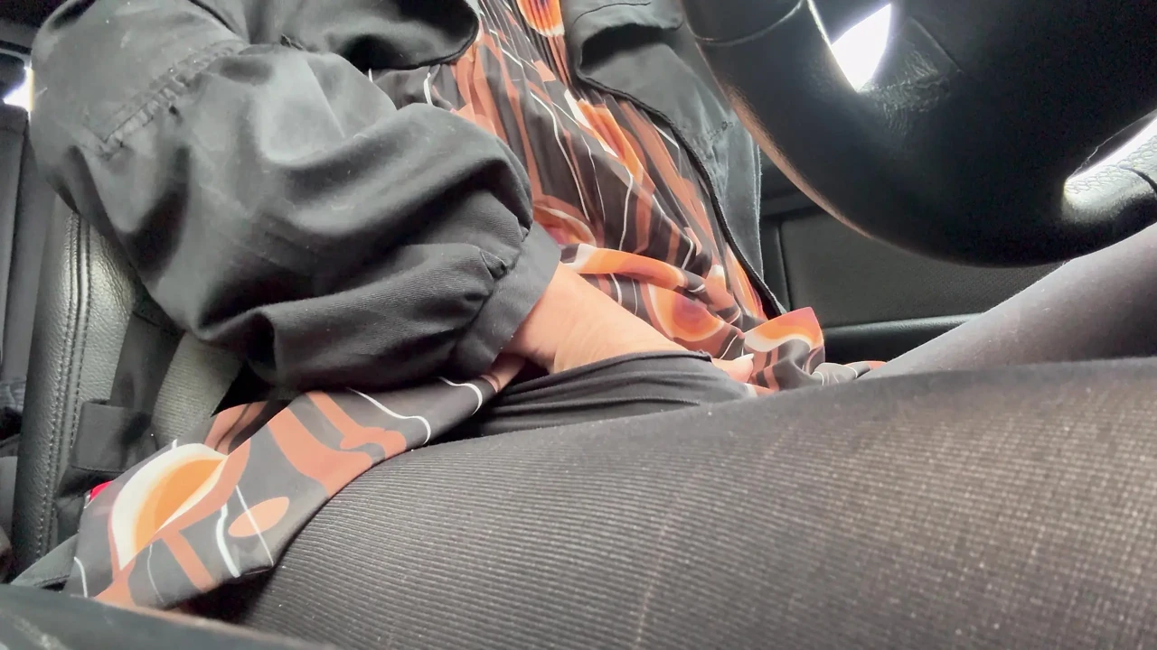Elegant stepmom drives to the office wearing tights and a beautiful dress