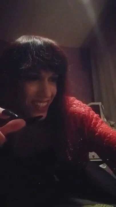 Horny shemale cums in glass and drinks it with a straw