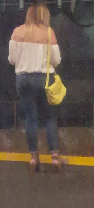 Quick shot blonde cutie on train platform
