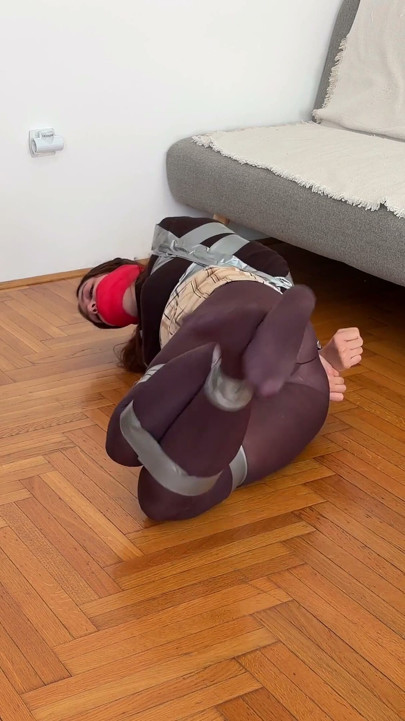 Struggling in Duct Tape & Elastic Band with Sock Gag