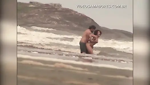 Shameless couple has sex in the shallow sea