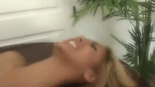 Horny blonde moans in pleasure as lover thrusts her pussy with his huge black cock