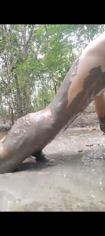 Boy masturbating in mud 
Full naked and sexy boy in a jungel