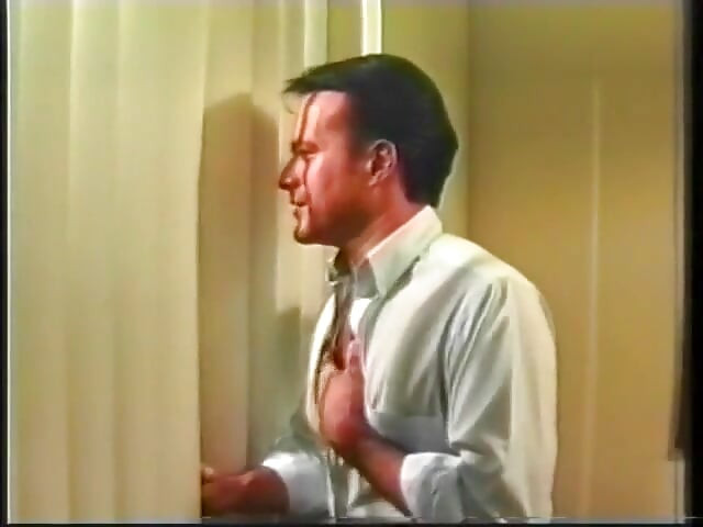 Gay lovers share one double headed dildo at the same time doggy style