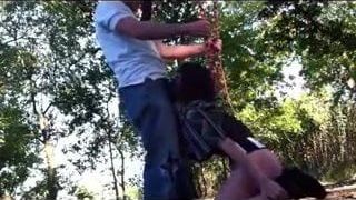 couple have fun with blowjob on public park swing