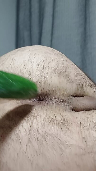 Hairy Turkish boy satisfies his hole with cucumber