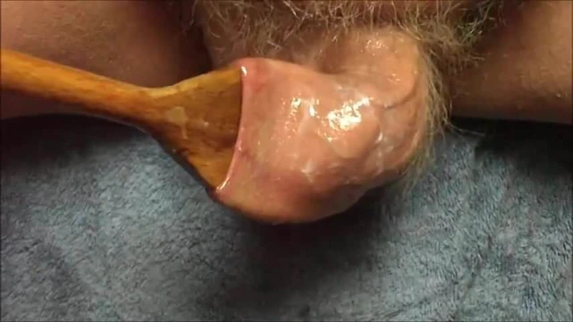 Large wooden spoon stretches foreskin - 5 more videos