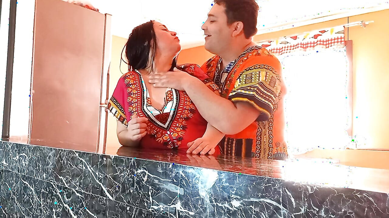 Indian stepmother gets fucked by her stepson in the kitchen.