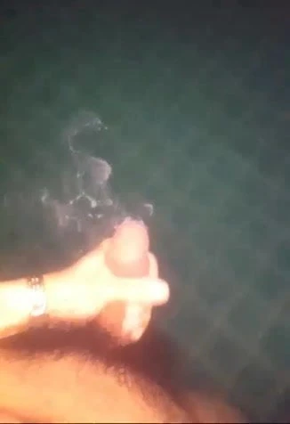 A short clip of underwater ejaculation at the swiming pool.