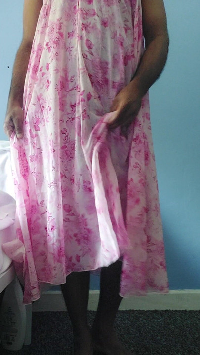 Shemale in a Silky seethrough floral fleared chiffon skirt