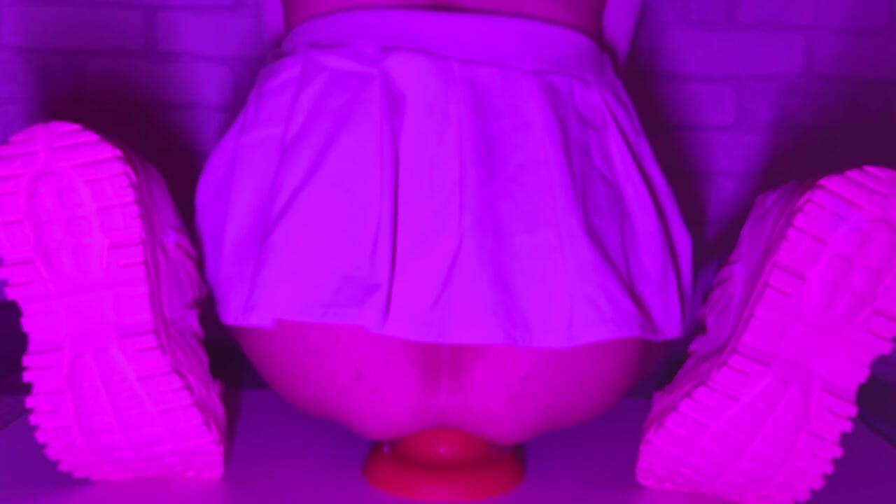 Sissy Girl In Short Skirt Bounces On a Huge 12-centimeter Thick Anal Plug