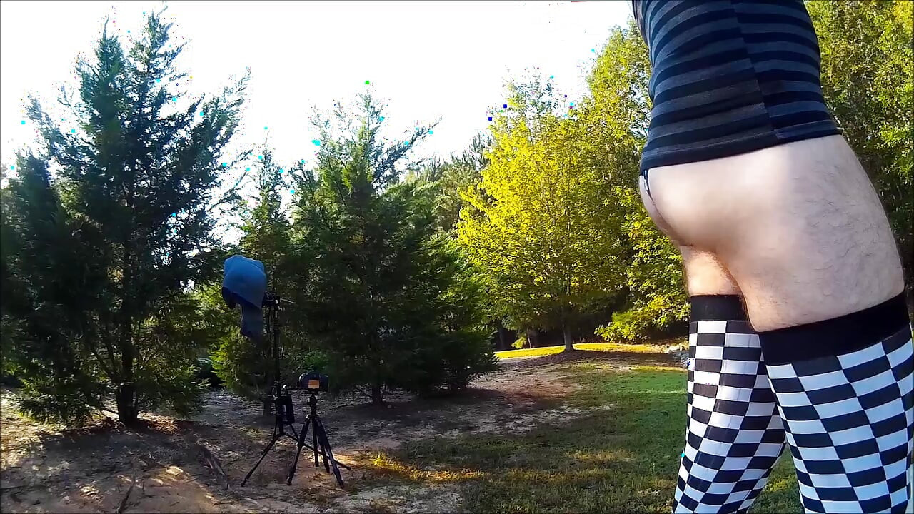 Crossdresser Walking in a public park in high heels