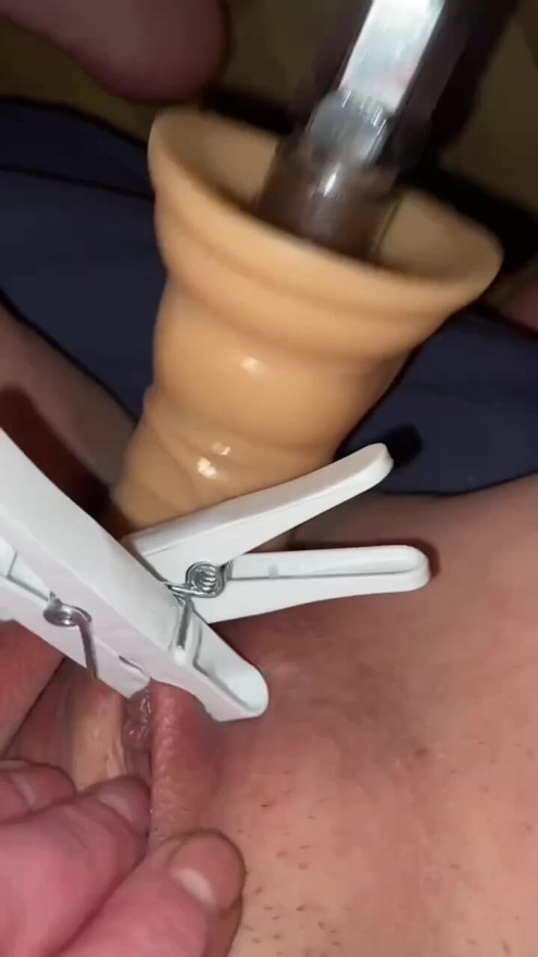 First time trying fuck machine with clamps on pussy