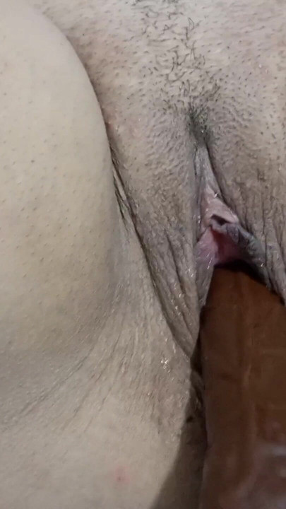 Key moment from "My perverted stepfather comes into my room and starts touching my pussy and inserting a black dildo inside me."