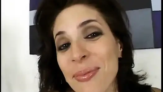 Brunette MILF loves sucking stiff cock on her knees