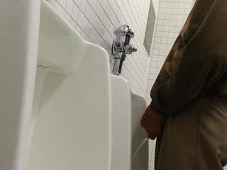 Older man getting relieving his bladder