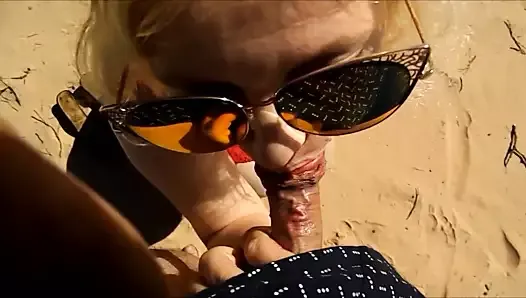 Blowjob from a mature mom on the beach