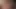 A slender blonde shows her naked body in front of the camera