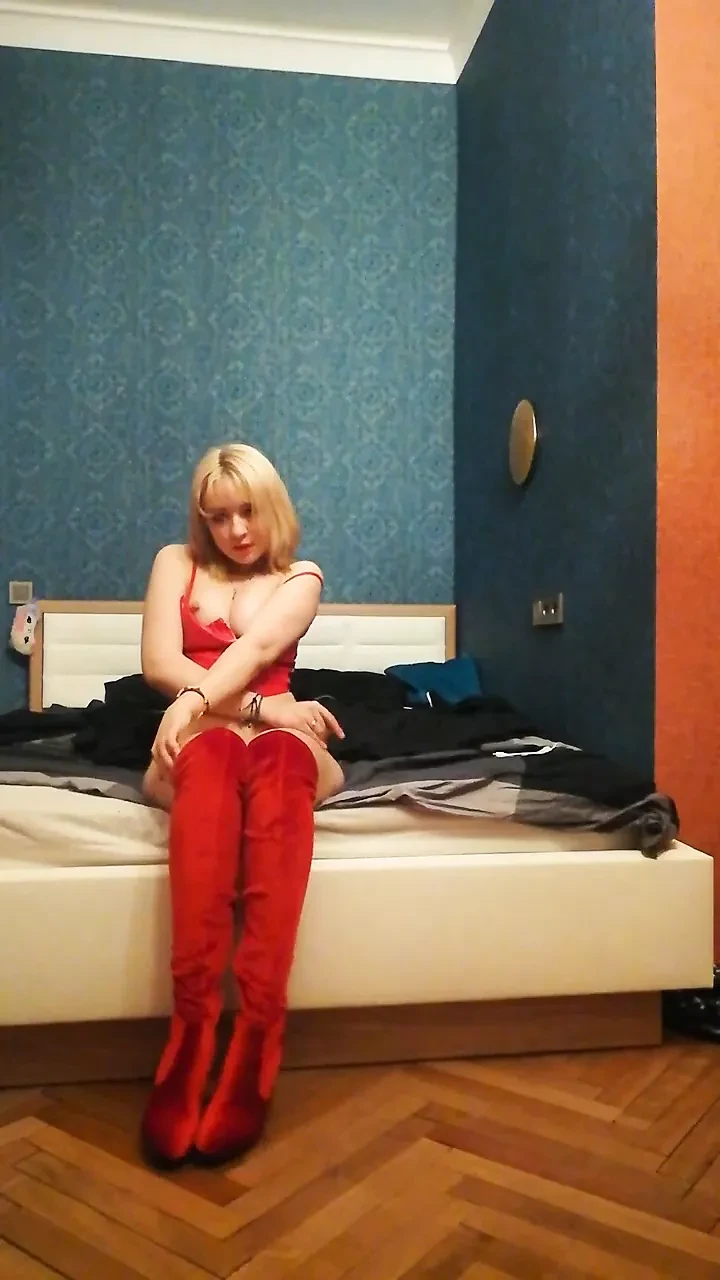 Home gentle masturbation in a red sexy leather suit and heels
