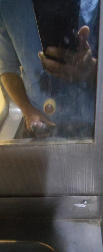 Key moment from "Desi guy jerking off in public train"