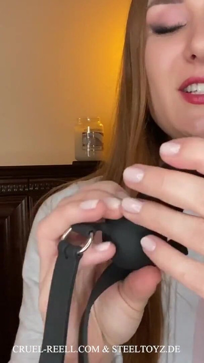 Jaw-dropping moment from "Explore BDSM with Cruel Reell and Steeltoyz: The Silicone Penis Gag for Intense Play"