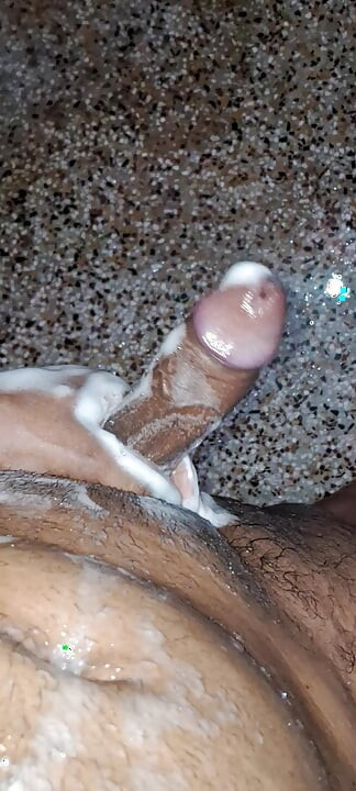 A Young Hindu Boy From India Is Fucking His Thick Cock Hard with His Hands While Taking a Bath