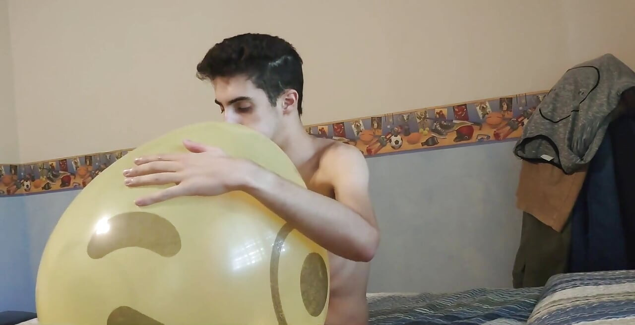 Blowing up a Huge Smiley Balloon While Jerking off