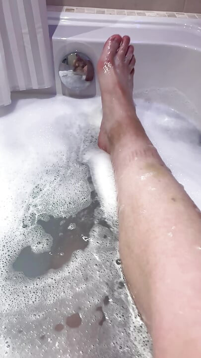 I enjoy soaking my sexy legs in the bathtub