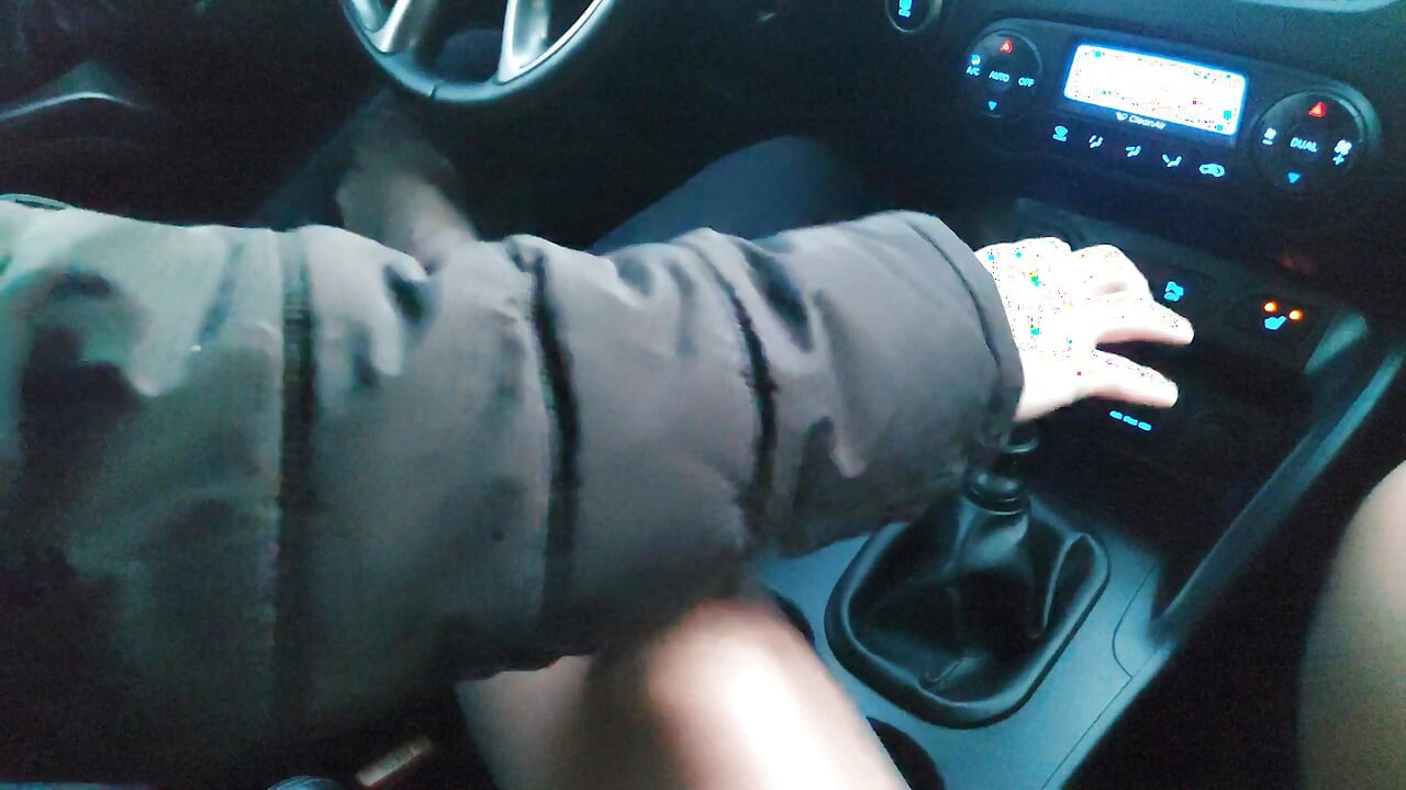 Hot mature stepmom in stockings gives her stepson a footjob in the car, while he drives
