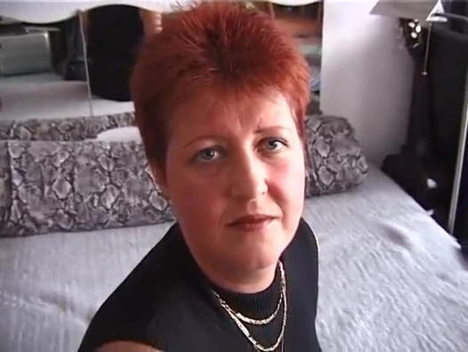 Redhead playing with her fingers and his cock