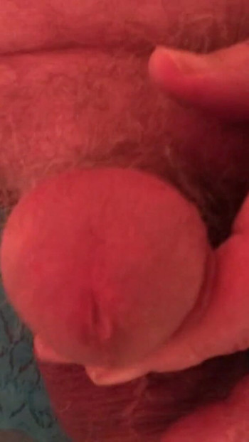 Iconic moment from "Pissing, then I oum 2 times.. Crossdresser twists his nipples, drips precum, pisses, estims and cums"