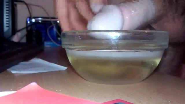 Dipping cock in wax