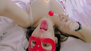 Hot and naughty student sucking lollipops at the bed wearing her new white lingerie and touching herself