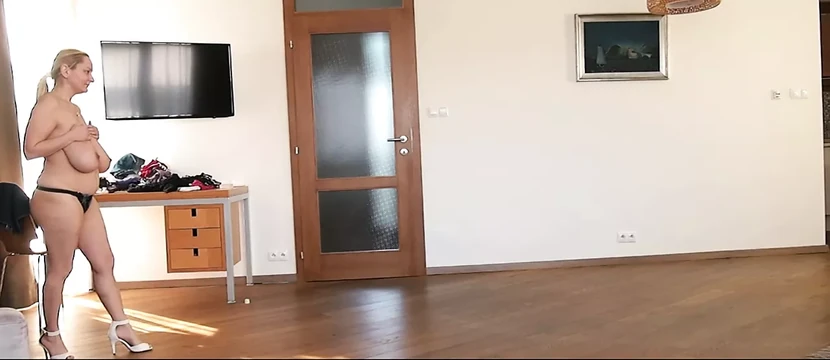 Natasha walks in white heels on widescreen