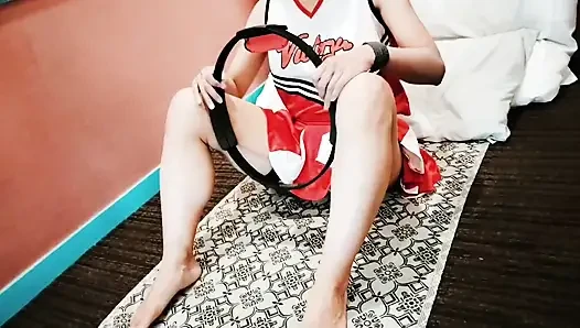 A cute, busty married woman does exercise 1 in an erotic cheerleader costume. Home made amateur Private Shoot