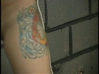 Brunette with tattoos and little titties submits