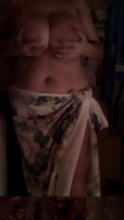wife massages her breasts