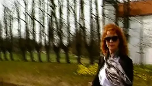 Redhead German MILF stuffs herself with dildo