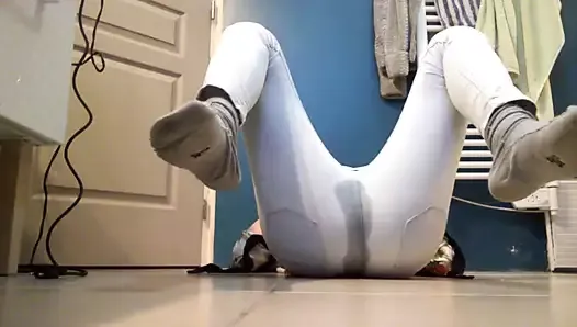 Emma pissing on all fours in her tight white pants