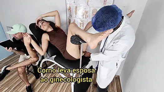 Wife well-endowed gynecologist while husband waits reading a book!