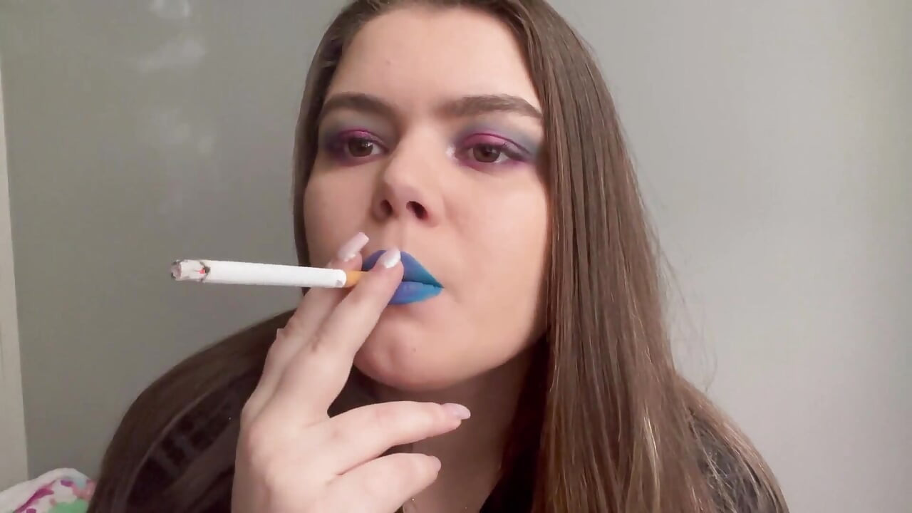 Sexy smoker with blue lipstick
