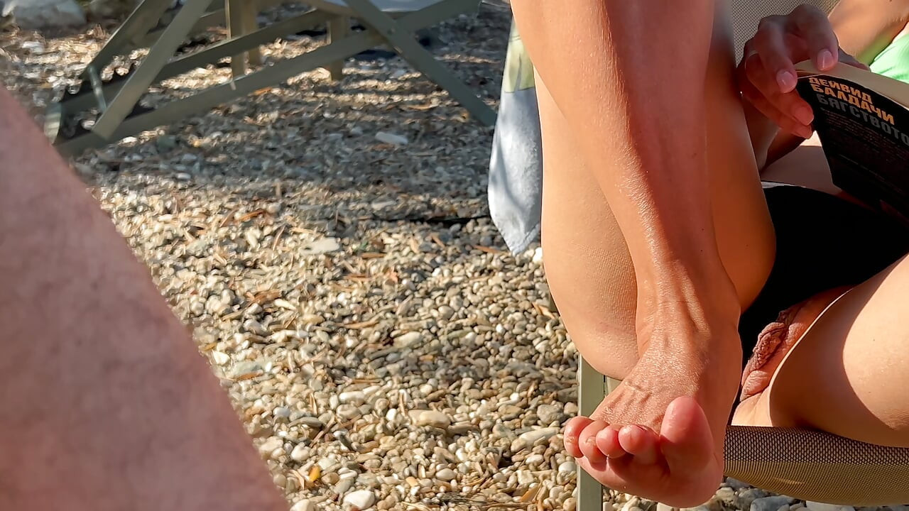 Touching and exposing my pussy on the public beach around people
